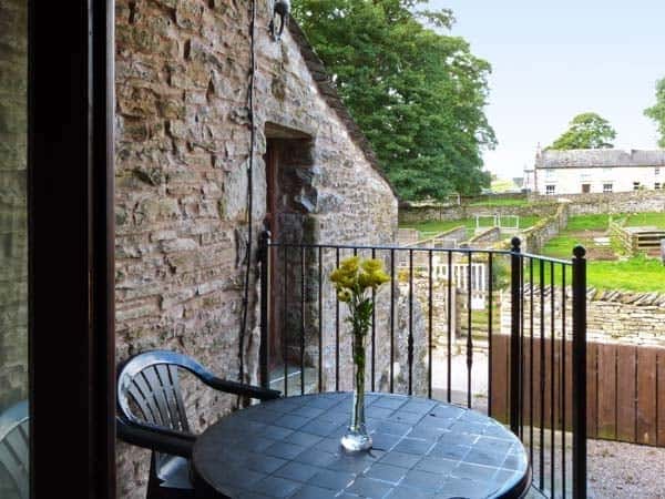 Stone-walled patio and fields at High Lane Farm